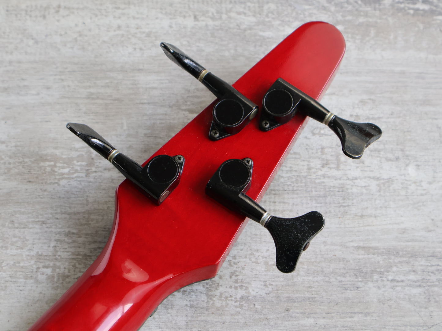 1987 Tokai Japan (Works Bass Revolution) TW-1500 Fretless Bass (Transparent Red)