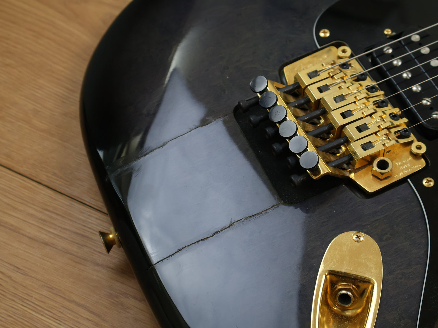 1980's Fender Japan STR-75 HSH Superstrat (Black/Grey Burst)