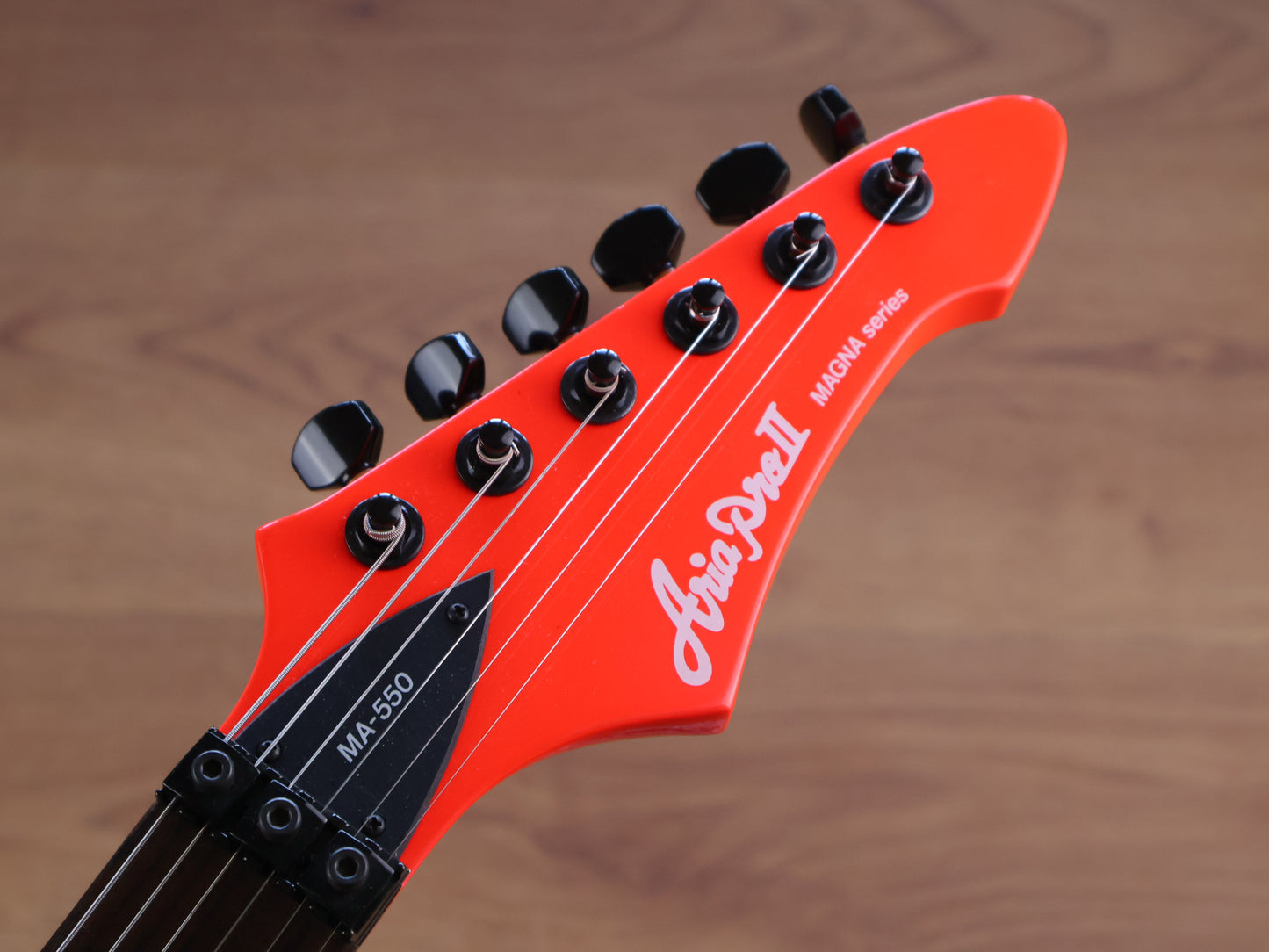 1989 Aria Pro II Magna Series MA-550 HSS Superstrat (Fluro Orange)