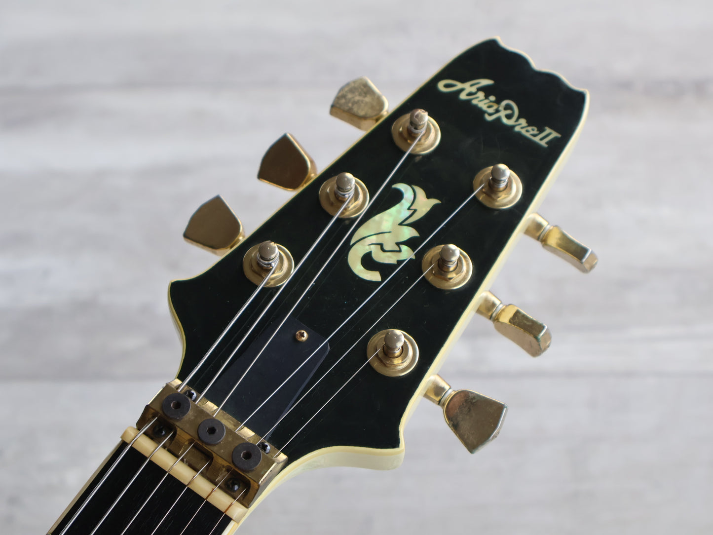 1990 Aria Pro II Japan PE-Deluxe KV Single Cutaway w/Kahler (Ivory)